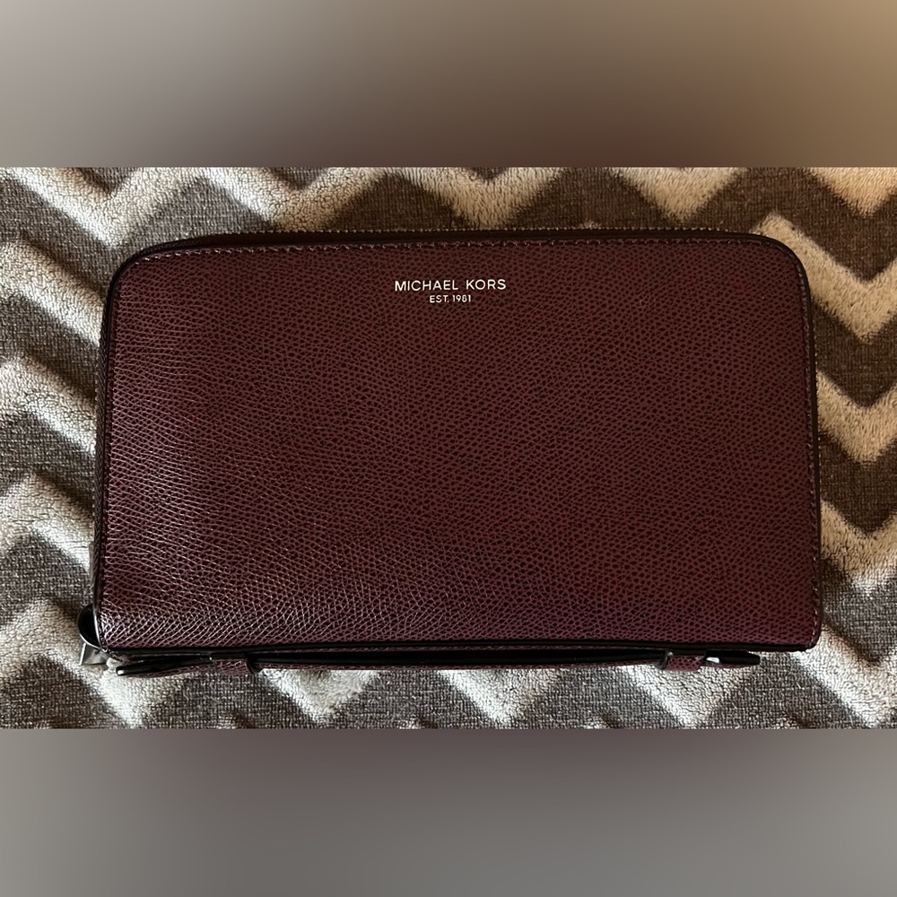 Merlot colored Michael Kors women’s wallet.
